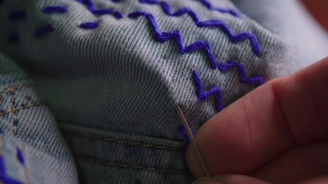 Mending jeans with Sashiko, a traditional Japanese embroidery and stitching technique