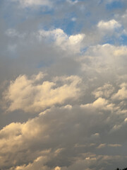 Scenic Skyscape Featuring Golden Clouds Against a Blue and Gray Backdrop