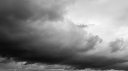 Grey sky filled with dramatic cumulus clouds.