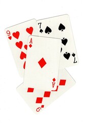 A random selection of playing cards isolated on a white background.