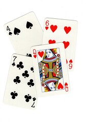 A random selection of playing cards isolated on a white background.