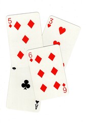 A random selection of playing cards isolated on a white background.