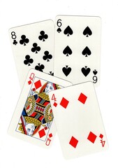 A random selection of playing cards isolated on a white background.