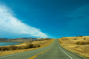 Country road, rural landscape in autumn season. Alberta Provincial Highway No. 22, also known as...