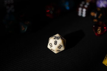 White D20 Dice with Colorful Bokeh Background