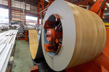 aluminum metal sheet fabricating roll, stock materials in the steel coil storage area, rolls metal sheet high quality durable meet standards industry. 