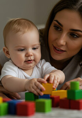 Cute baby playing toy with mother