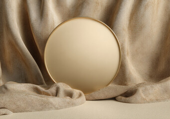 Beige background with a gold circular podium and light brown silk fabric