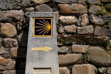 Sign with the symbol of the Camino de Santiago pilgrimage path in Galicia