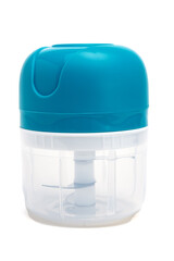 Portable small blender for crushing fruits and vegetables on white background.