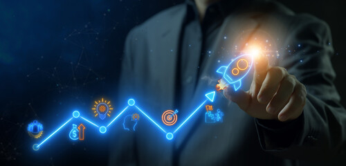 Startup business concept, Glowing neon line of launching rocket with icons of of innovation,...