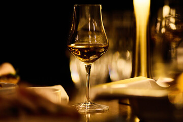 Luxury whiskey glasses in warm lighting