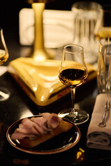 Luxury whiskey glasses in warm lighting