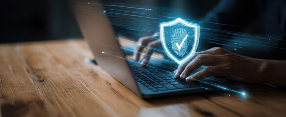 The digital security shield protecting user data on a laptop.