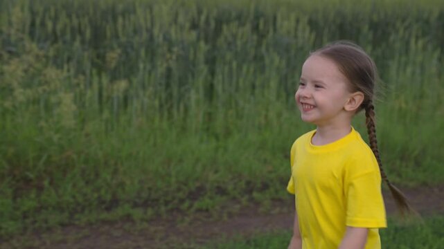 little child running along road, happy kid playing street laughing, cheerful little girl smiling playing catch-up, baby hurrying moving forward, countryside, healthy movement childhood outdoors nature