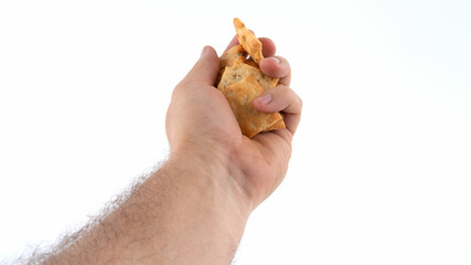 Holding a crispy pastry on a white background