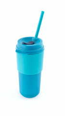 Bright blue reusable cup with straw for drinks
