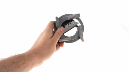 Hand with gray device on white