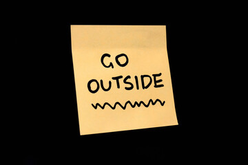 A sticky note encourages going outside for fresh air and relaxation