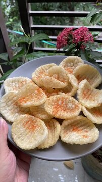 Crispy potato chips, delicious BBQ seasoning spicy for crips, slice deep fried snack fast food. 