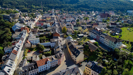 Aerial panorama view of the old town of the city Elsterberg on a sunny noon in summer in Germany.