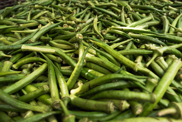 Green okras on display for sale at a traditional Brazilian fair. Healthy food. Nutrition