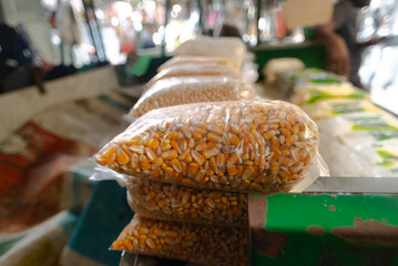 Grains and seeds for sale inside a bag at a traditional fair. Healthy seeds.