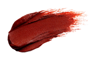 Close-up of deep red lipstick swatch on a transparent background creates drama