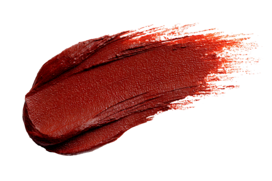 Close-up of deep red lipstick swatch on a transparent background creates drama