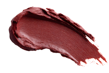 Elegant close-up of a smeared, rich burgundy lipstick against a transparent backdrop