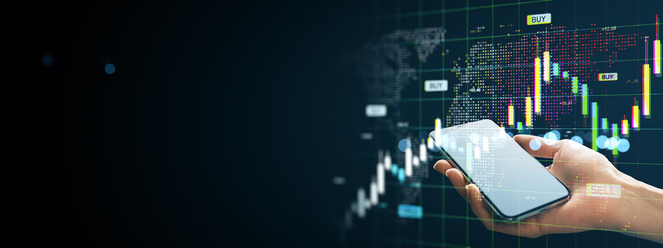 Smartphone in hand showing financial stock market trading graphs and global exchange data on digital interface with dark space for copy.