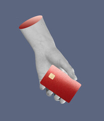 Card in hand. Human finger holding plastic bank card, warning of scam, phishing, and theft risk.