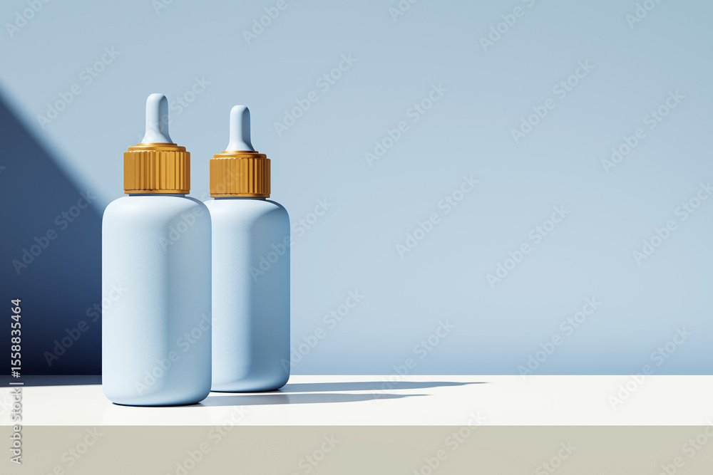 Poster two modern cosmetic dropper bottles with golden caps on light surface, clean blue gradient backgroun