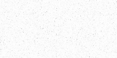 White terrazzo background with scattered gray and black dots. Rock spatter stone marble backdrop. Wall texture with noise overlay pattern. Vintage quartz terrazzo flooring.	