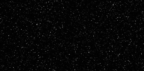 Terrazzo black background with scattered gray and white dots. Rock spatter stone marble backdrop. Black wall texture with noise overlay pattern. Vintage quartz terrazzo flooring.	