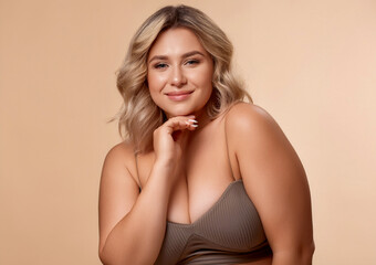 Self Acceptance. Beautiful Curvy Lady In Underwear Posing On Beige Background In Studio, Body Positive Plus Size Woman Enjoying Her Natural Beauty, Cropped Image © venars.original