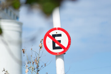 traffic sign informing that stopping is prohibited. Street