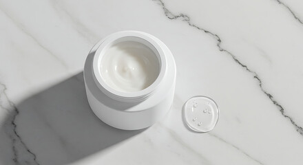 White Cream Jar with Serum Drop on Marble Surface.