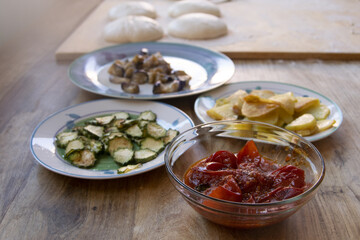 homemade pizza ingredients ready for baking
