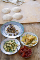 homemade pizza ingredients ready for baking