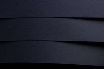 Premium navy blue designer paper texture with an elegant geometric design. Deep, dark shadows
