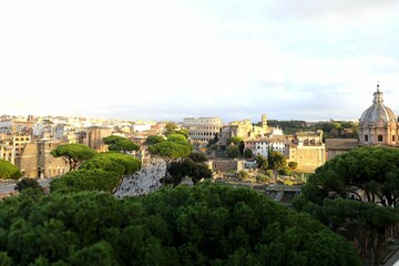 Fototapeta premium Via dei Fori Imperiali Leading to the Colosseum at Sunset, Rome at sunset