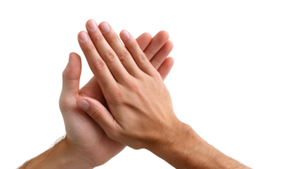 Clapping Hands: A close-up shot of hands clapped together in a gesture of approval, appreciation, or celebration. The image captures the texture of skin and conveys a sense of warmth. 