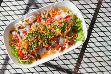 Close-up of fresh shrimp salad on the table.