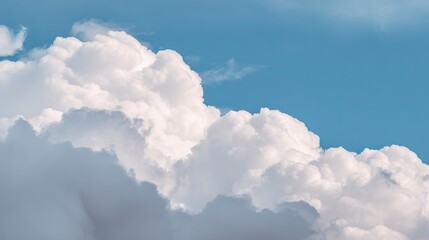 Fluffy white clouds against blue sky symbolizing hope and tranquility, capturing nature's vast beauty with soft textures for ethereal atmosphere, perfect for calm creative projects.