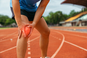 Runner Knee Pain Injury on Outdoor Track