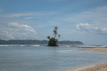 Aerial view of a beautiful small tropical island. Aerial view of a small island with turquoise water