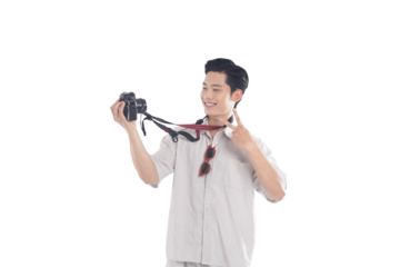 Capture the Moment: An Asian man, radiating joy, holds a camera, poised to seize a memory, ready to encapsulate the world through his lens. 