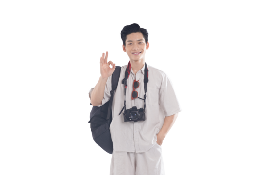 Optimistic Traveler: A smiling male traveler with a camera and backpack exudes positivity with an "okay" hand gesture, symbolizing readiness for a new adventure.