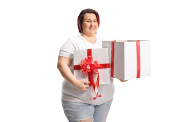 Excited woman holding a present in a box